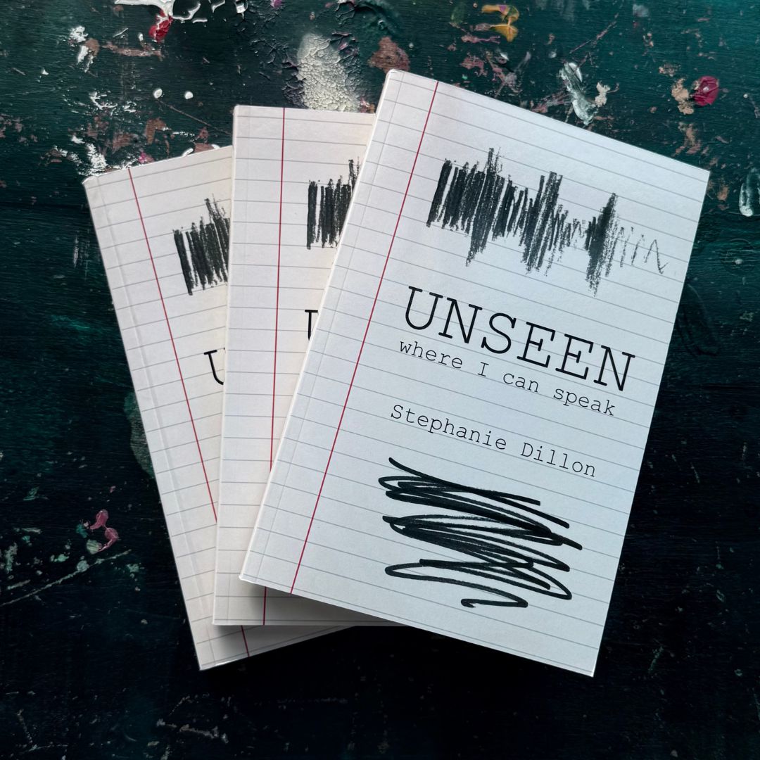 Book titled 'Unseen where I can speak' by Stephanie Dillon on a dark textured surface.